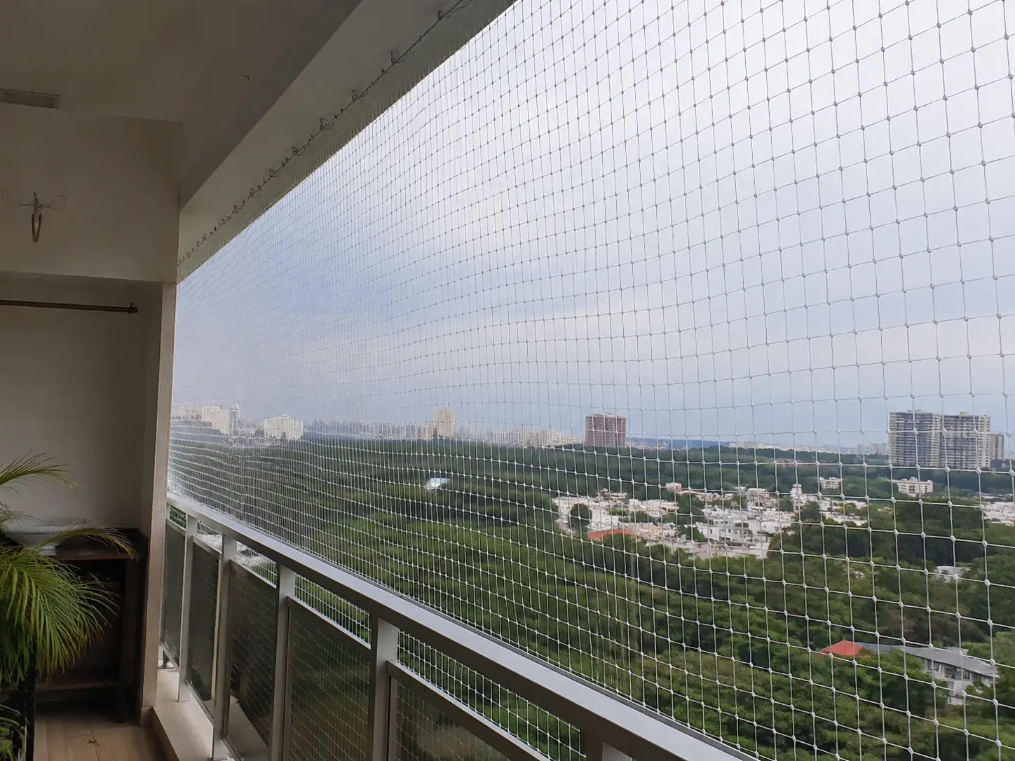 Bird safety net installed on balcony and windows
